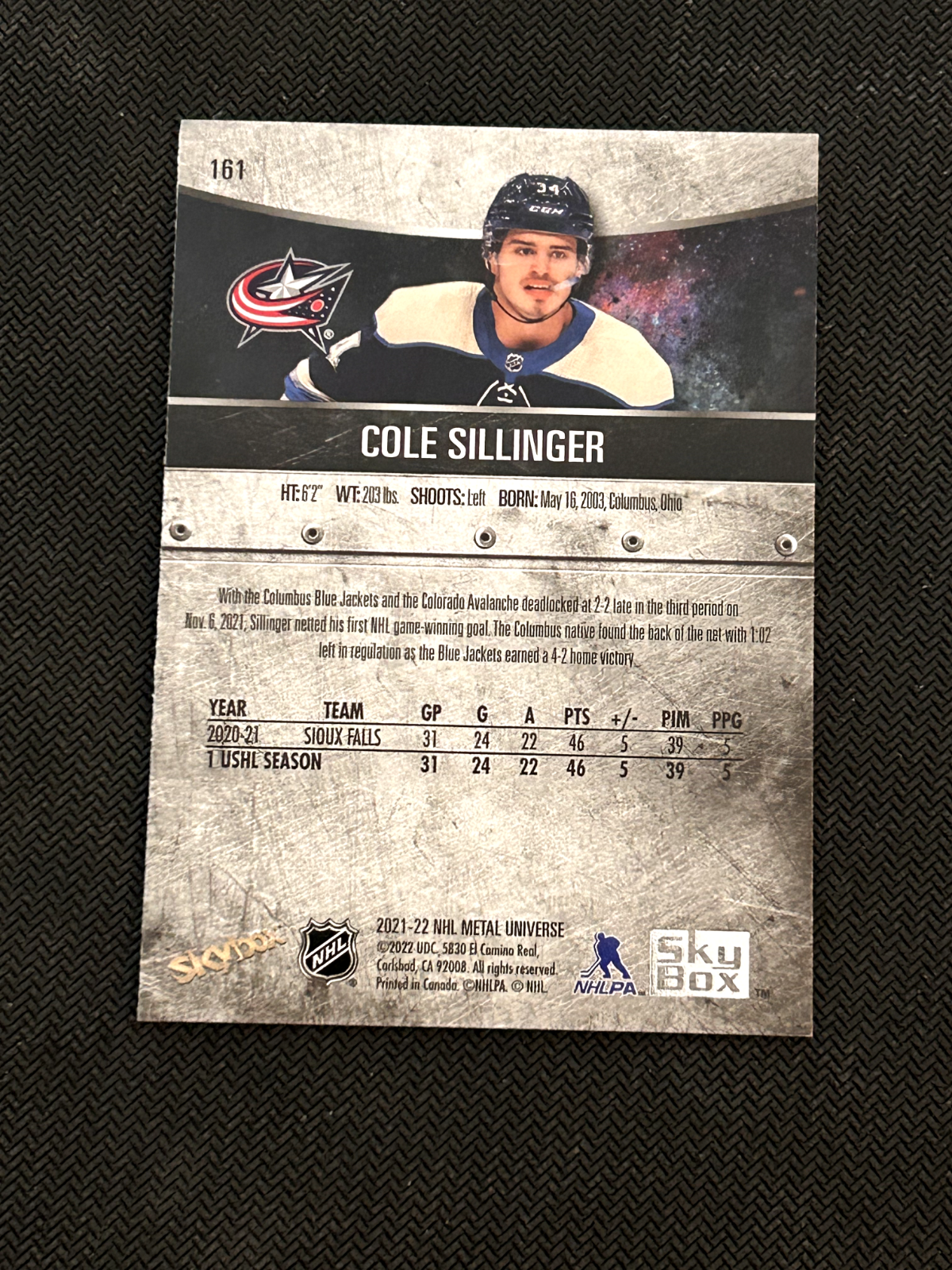 2021-22 Skybox Metal Universe Cole Sillinger Rookie Card # 161