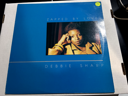 Debbie Sharp – Zapped By Love