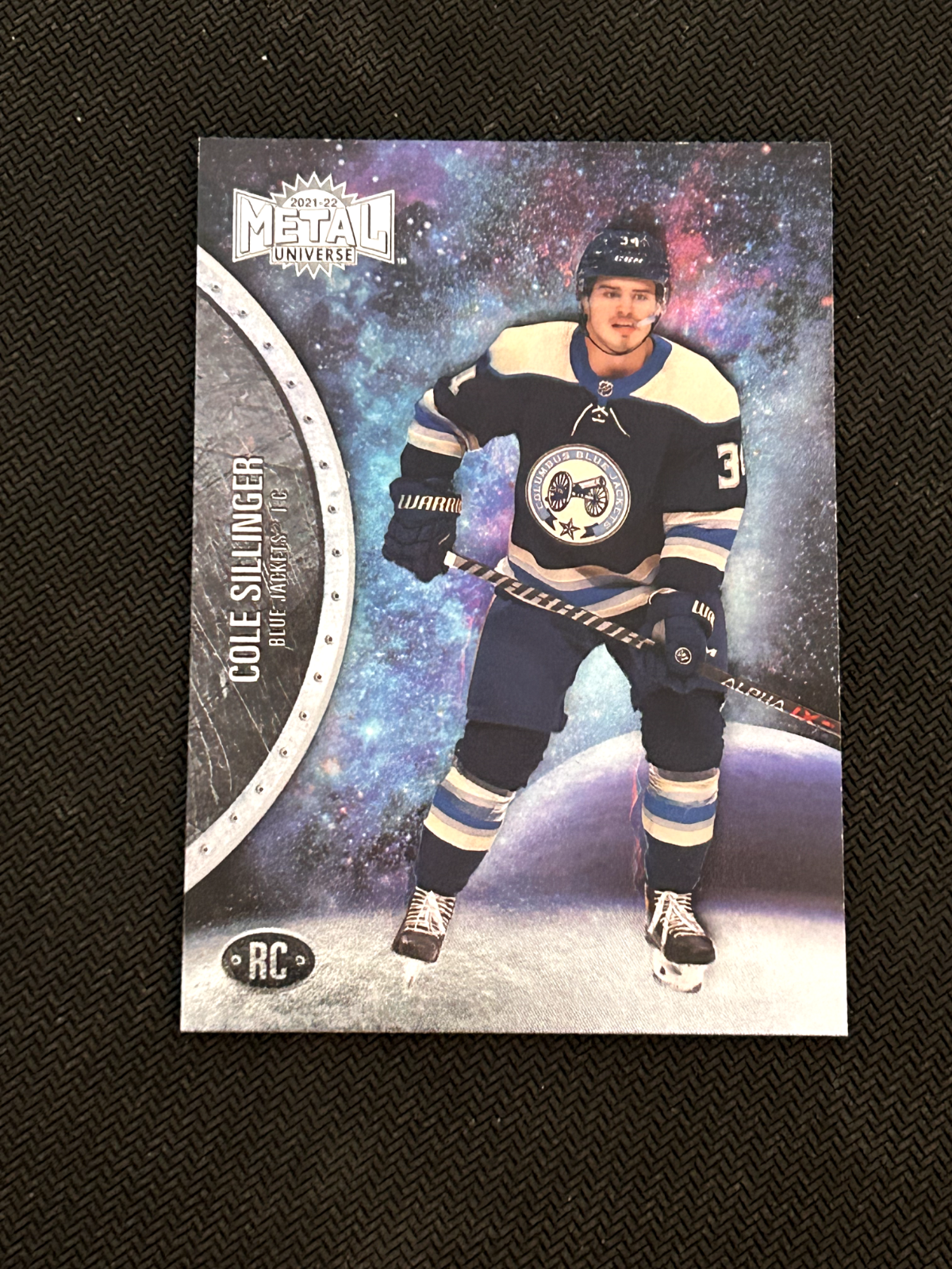 2021-22 Skybox Metal Universe Cole Sillinger Rookie Card # 161